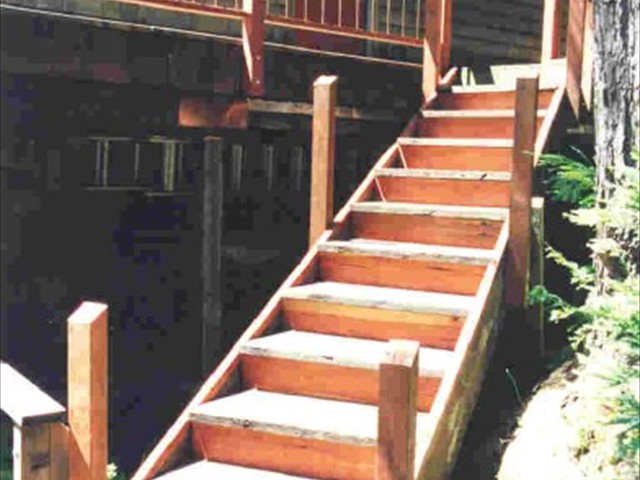 Pressure treated staircase with redwood riser coverings – King’s Mountain